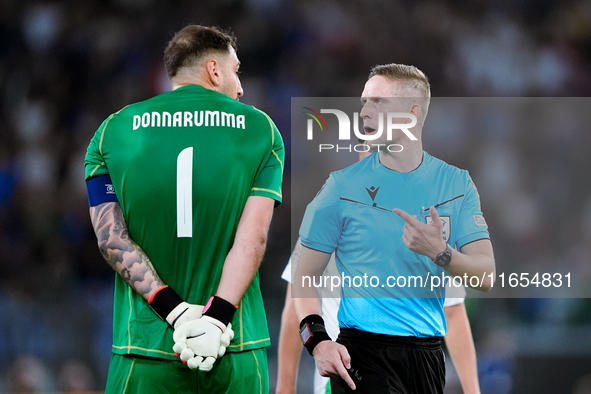 Gianluigi Donnarumma of Italy protests with the referee Espen Eskas for a penalty kick during the UEFA Nations League 2024/25 League A Group...