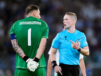 Gianluigi Donnarumma of Italy protests with the referee Espen Eskas for a penalty kick during the UEFA Nations League 2024/25 League A Group...