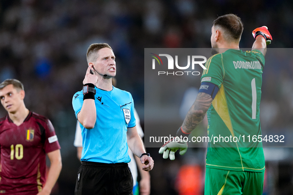 Gianluigi Donnarumma of Italy protests with the referee Espen Eskas for a penalty kick during the UEFA Nations League 2024/25 League A Group...