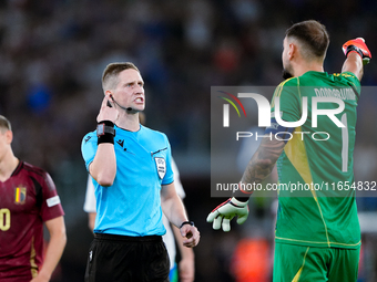 Gianluigi Donnarumma of Italy protests with the referee Espen Eskas for a penalty kick during the UEFA Nations League 2024/25 League A Group...