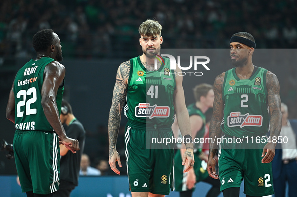 Juancho Hernangomez, Lorenzo Brown, and Jerian Grant of Panathinaikos AKTOR Athens play during the Euroleague, Round 2 match between Panathi...