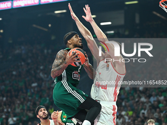 Lorenzo Brown of Panathinaikos AKTOR Athens competes with Johannes Voigtmann of FC Bayern Munich during the Euroleague, Round 2 match betwee...