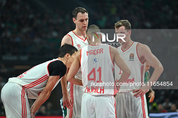 Andreas Obst, Johannes Voigtmann, Yam Madar, and Vladimir Lucic of FC Bayern Munich play during the Euroleague, Round 2 match between Panath...