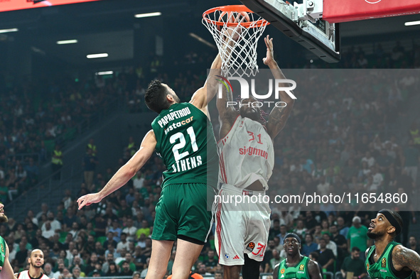 Devin Booker of FC Bayern Munich competes with Ioannis Papapetrou of Panathinaikos AKTOR Athens during the Euroleague, Round 2 match between...