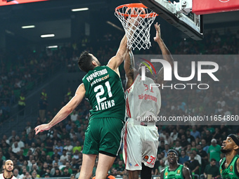 Devin Booker of FC Bayern Munich competes with Ioannis Papapetrou of Panathinaikos AKTOR Athens during the Euroleague, Round 2 match between...