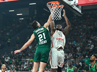 Devin Booker of FC Bayern Munich competes with Ioannis Papapetrou of Panathinaikos AKTOR Athens during the Euroleague, Round 2 match between...