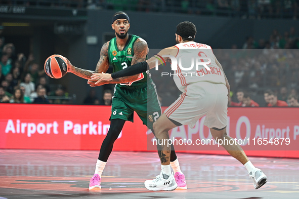 Lorenzo Brown of Panathinaikos AKTOR Athens competes with Nick Weiler-Babb of FC Bayern Munich during the Euroleague, Round 2 match between...