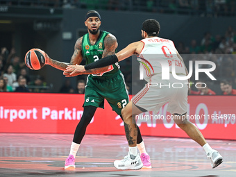 Lorenzo Brown of Panathinaikos AKTOR Athens competes with Nick Weiler-Babb of FC Bayern Munich during the Euroleague, Round 2 match between...