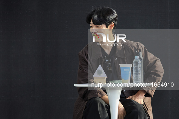 Actor Ryu Jun Yeol and Director Leos Carax attend their Open Talk stage at Cinema Center in Busan, South Korea, on October 9, 2024. 