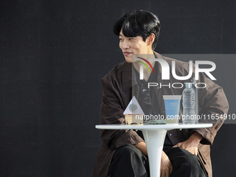 Actor Ryu Jun Yeol and Director Leos Carax attend their Open Talk stage at Cinema Center in Busan, South Korea, on October 9, 2024. (