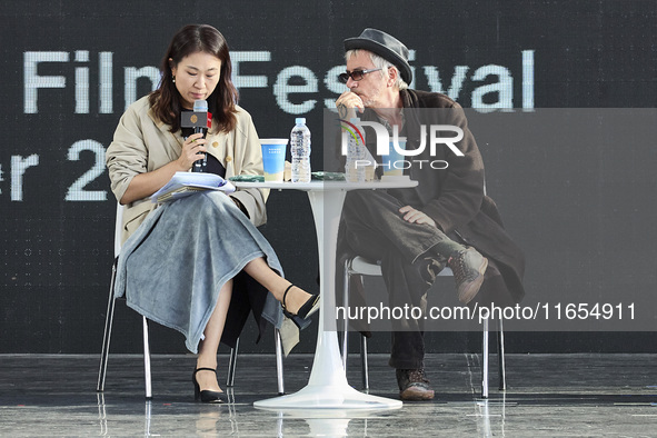 Actor Ryu Jun Yeol and Director Leos Carax attend their Open Talk stage at Cinema Center in Busan, South Korea, on October 9, 2024. 