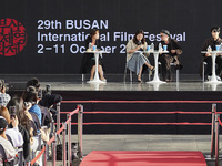 Actor Ryu Jun Yeol and Director Leos Carax attend their Open Talk stage at Cinema Center in Busan, South Korea, on October 9, 2024. (