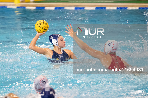 Eleni Beta (4) is seen in action during the match Olympiacos vs. National Piraeus during the Final Water Polo Super Cup at Papastrateio Swim...