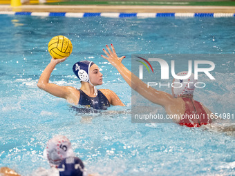 Eleni Beta (4) is seen in action during the match Olympiacos vs. National Piraeus during the Final Water Polo Super Cup at Papastrateio Swim...