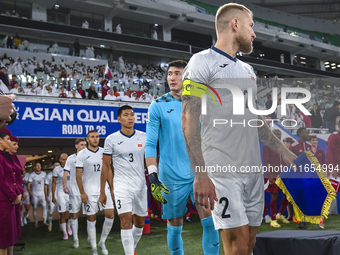 Players of Kyrgyzstan and Qatar arrive on the pitch before the FIFA World Cup 2026 AFC Asian Qualifiers 3rd round group A match between Qata...