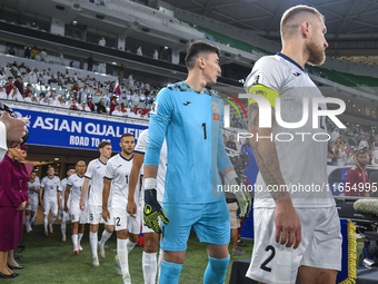 Players of Kyrgyzstan and Qatar arrive on the pitch before the FIFA World Cup 2026 AFC Asian Qualifiers 3rd round group A match between Qata...