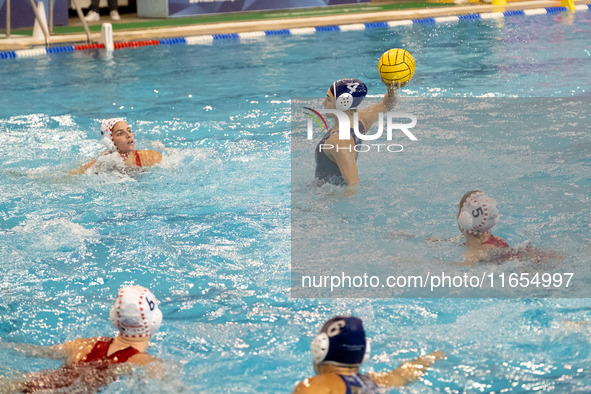 Eleni Beta (4) is seen in action during the match Olympiacos vs. National Piraeus during the Final Water Polo Super Cup at Papastrateio Swim...