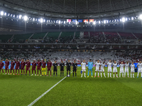 Players of Kyrgyzstan and Qatar line up before the FIFA World Cup 2026 AFC Asian Qualifiers 3rd round group A match between Qatar and Kyrgyz...