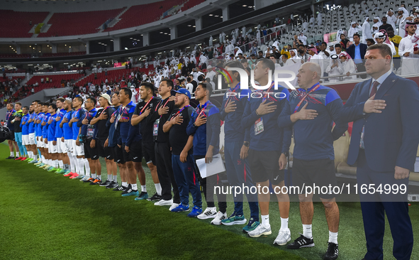 Kyrgyzstan National team Head Coach Maksim Lisitsyn, his staff, and substitutes line up before the FIFA World Cup 2026 AFC Asian Qualifiers...