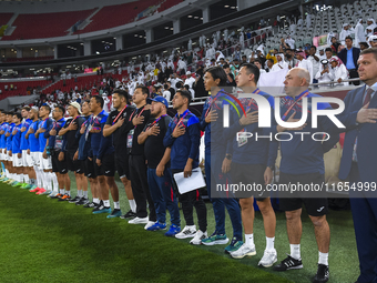 Kyrgyzstan National team Head Coach Maksim Lisitsyn, his staff, and substitutes line up before the FIFA World Cup 2026 AFC Asian Qualifiers...