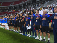 Kyrgyzstan National team Head Coach Maksim Lisitsyn, his staff, and substitutes line up before the FIFA World Cup 2026 AFC Asian Qualifiers...