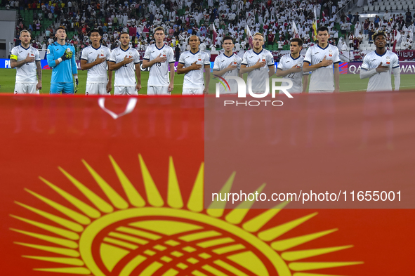 Players of Kyrgyzstan line up before the FIFA World Cup 2026 AFC Asian Qualifiers 3rd round group A match between Qatar and Kyrgyzstan at Al...