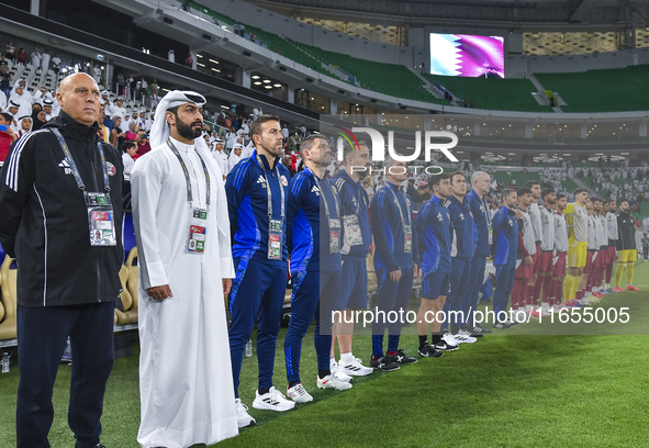 Qatar National team head coach Bartolome Marquez, his staff, and substitutes line up before the FIFA World Cup 2026 AFC Asian Qualifiers 3rd...