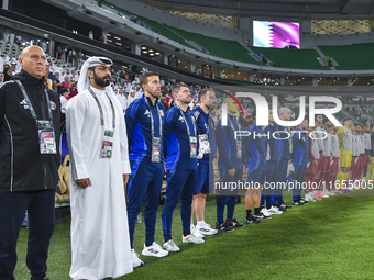 Qatar National team head coach Bartolome Marquez, his staff, and substitutes line up before the FIFA World Cup 2026 AFC Asian Qualifiers 3rd...