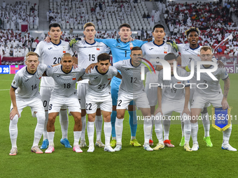 Players of Kyrgyzstan pose for a team photo before the FIFA World Cup 2026 AFC Asian Qualifiers 3rd round group A match between Qatar and Ky...