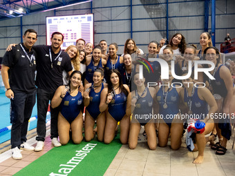 The National Piraeus team poses for a photo after the match Olympiacos vs. National Piraeus during the Final Water Polo Super Cup at Papastr...