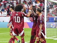 Almoez Ali (C) of Qatar celebrates with teammates after scoring the opening goal during the FIFA World Cup 2026 AFC Asian Qualifiers 3rd rou...