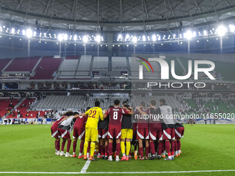 Players of Qatar celebrate after winning the FIFA World Cup 2026 AFC Asian Qualifiers 3rd round group A match between Qatar and Kyrgyzstan a...