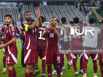 Players of Qatar celebrate after winning the FIFA World Cup 2026 AFC Asian Qualifiers 3rd round group A match between Qatar and Kyrgyzstan a...