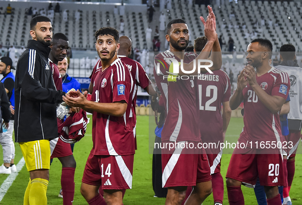 Players of Qatar celebrate after winning the FIFA World Cup 2026 AFC Asian Qualifiers 3rd round group A match between Qatar and Kyrgyzstan a...