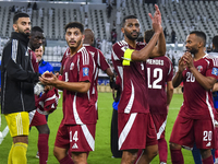 Players of Qatar celebrate after winning the FIFA World Cup 2026 AFC Asian Qualifiers 3rd round group A match between Qatar and Kyrgyzstan a...