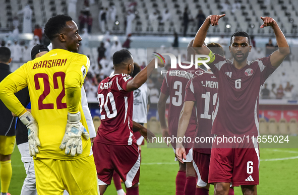 Players of Qatar celebrate after winning the FIFA World Cup 2026 AFC Asian Qualifiers 3rd round group A match between Qatar and Kyrgyzstan a...