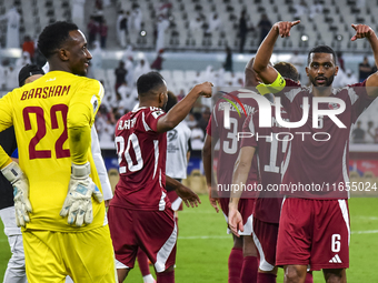 Players of Qatar celebrate after winning the FIFA World Cup 2026 AFC Asian Qualifiers 3rd round group A match between Qatar and Kyrgyzstan a...