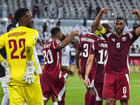 Players of Qatar celebrate after winning the FIFA World Cup 2026 AFC Asian Qualifiers 3rd round group A match between Qatar and Kyrgyzstan a...