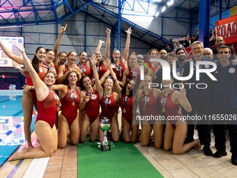 The Olympiacos team celebrates its win after the match Olympiacos vs. National Piraeus during the Final Water Polo Super Cup at Papastrateio...