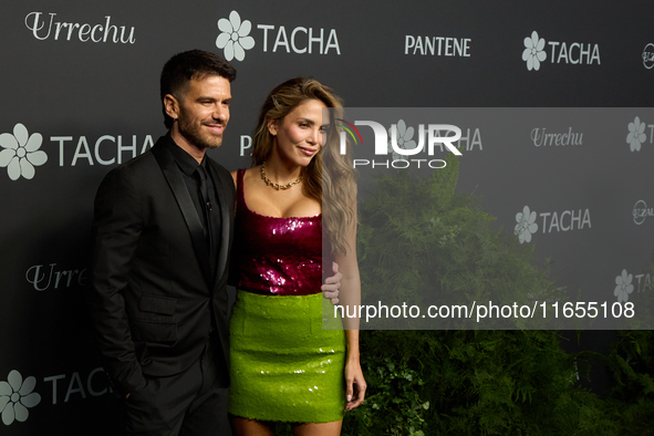 Andy McDougall and Rosanna Zanetti attend a photocall for the anniversary of Tacha in Madrid, Spain, on October 10, 2024. 