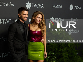 Andy McDougall and Rosanna Zanetti attend a photocall for the anniversary of Tacha in Madrid, Spain, on October 10, 2024. (