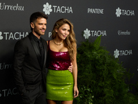 Andy McDougall and Rosanna Zanetti attend a photocall for the anniversary of Tacha in Madrid, Spain, on October 10, 2024. (