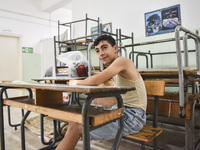 Distribution of rations from UNICEF and the Ministry of Social Affairs occurs in schools for displaced people in Beirut, Lebanon, on October...