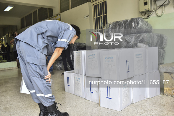 Distribution of rations from UNICEF and the Ministry of Social Affairs occurs in schools for displaced people in Beirut, Lebanon, on October...