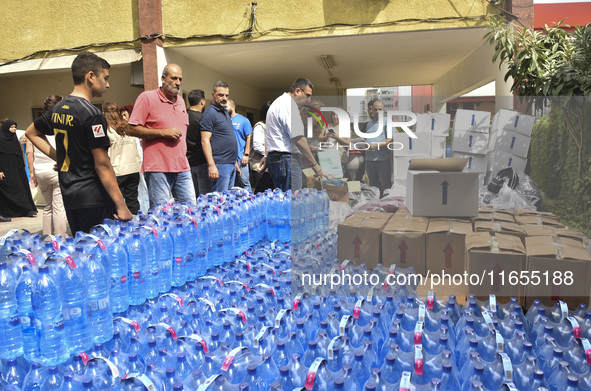 Distribution of rations from UNICEF and the Ministry of Social Affairs occurs in schools for displaced people in Beirut, Lebanon, on October...