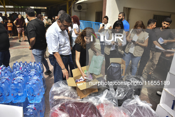 Distribution of rations from UNICEF and the Ministry of Social Affairs occurs in schools for displaced people in Beirut, Lebanon, on October...