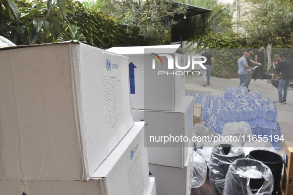 Distribution of rations from UNICEF and the Ministry of Social Affairs occurs in schools for displaced people in Beirut, Lebanon, on October...