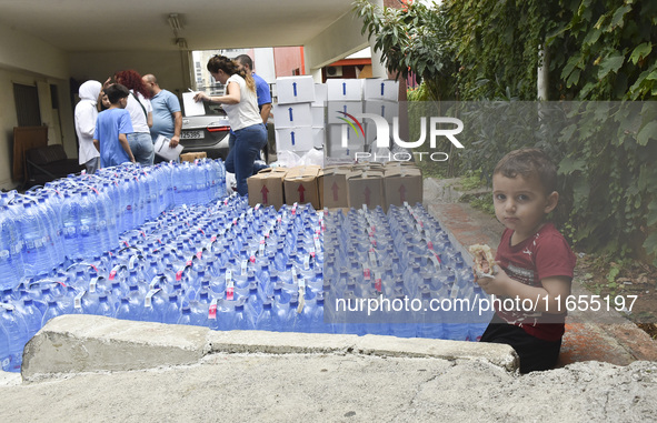 Distribution of rations from UNICEF and the Ministry of Social Affairs occurs in schools for displaced people in Beirut, Lebanon, on October...