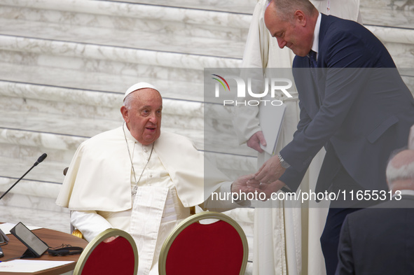 Pope Francis attends the Instrumentum laboris part II at the Paolo VI Hall in the Vatican on October 10, 2024. 