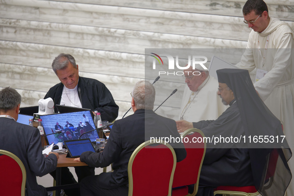 Pope Francis attends the Instrumentum laboris part II at the Paolo VI Hall in the Vatican on October 10, 2024. 